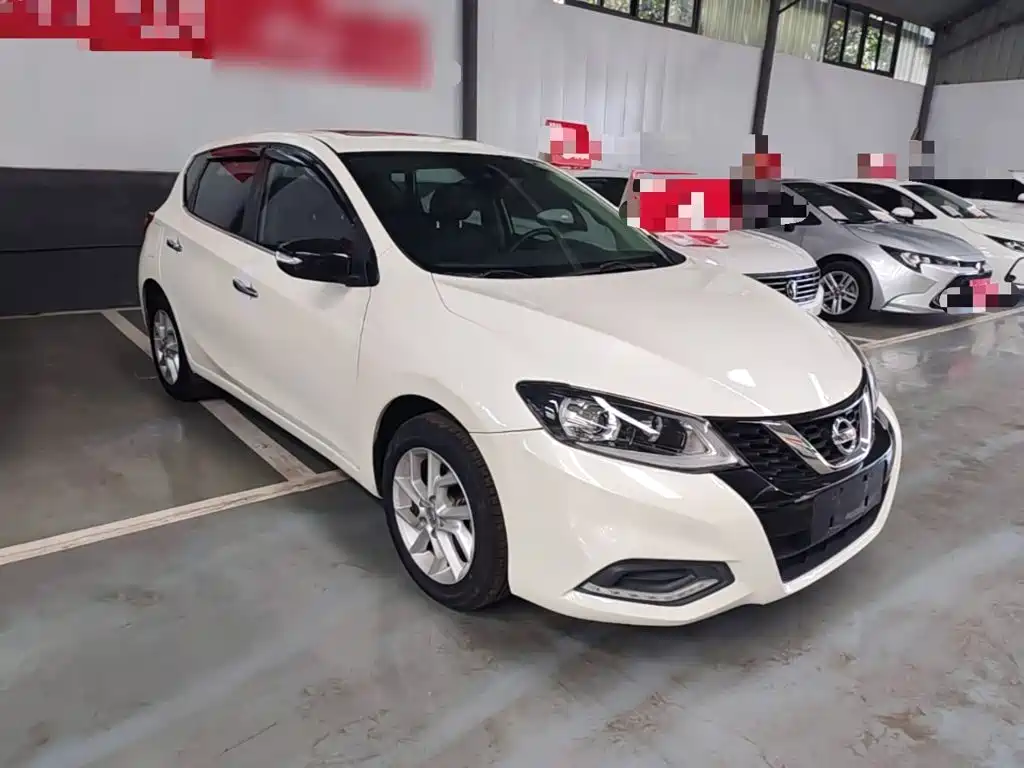 Nissan Tiida — фото 4