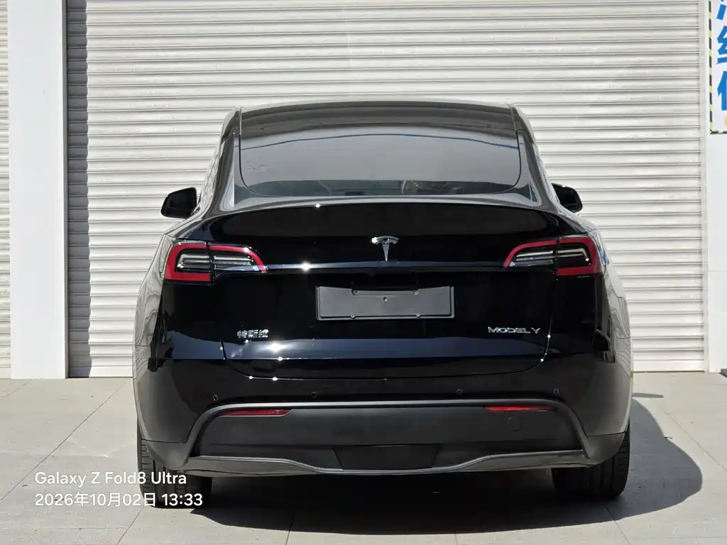 Tesla Model Y — фото 10