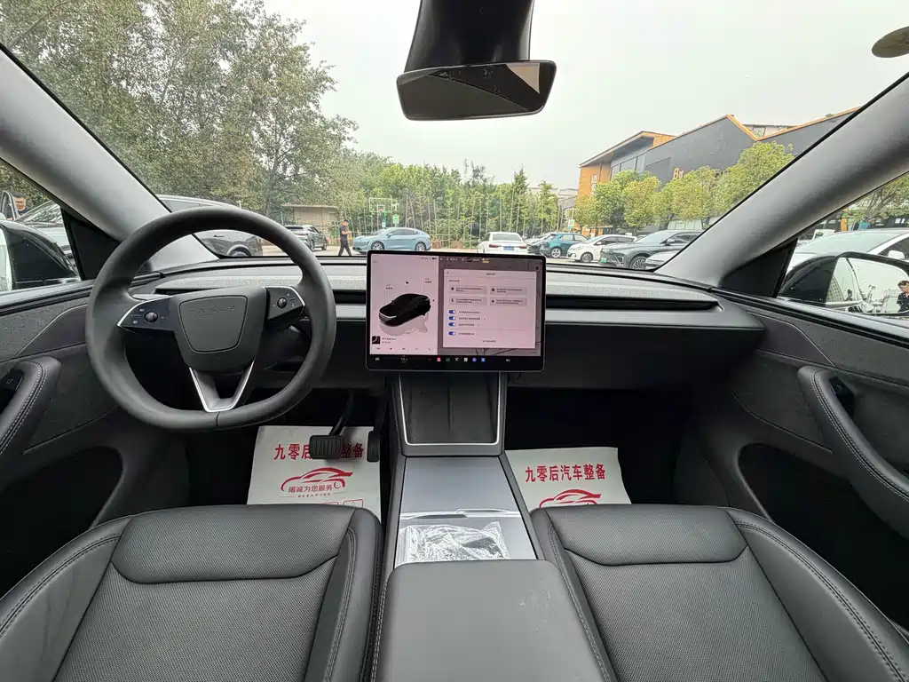 Tesla Model Y — фото 13
