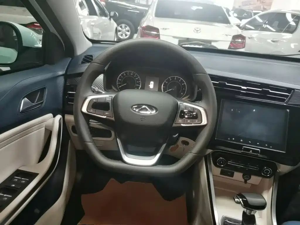 Chery Tiggo 3x — фото 11