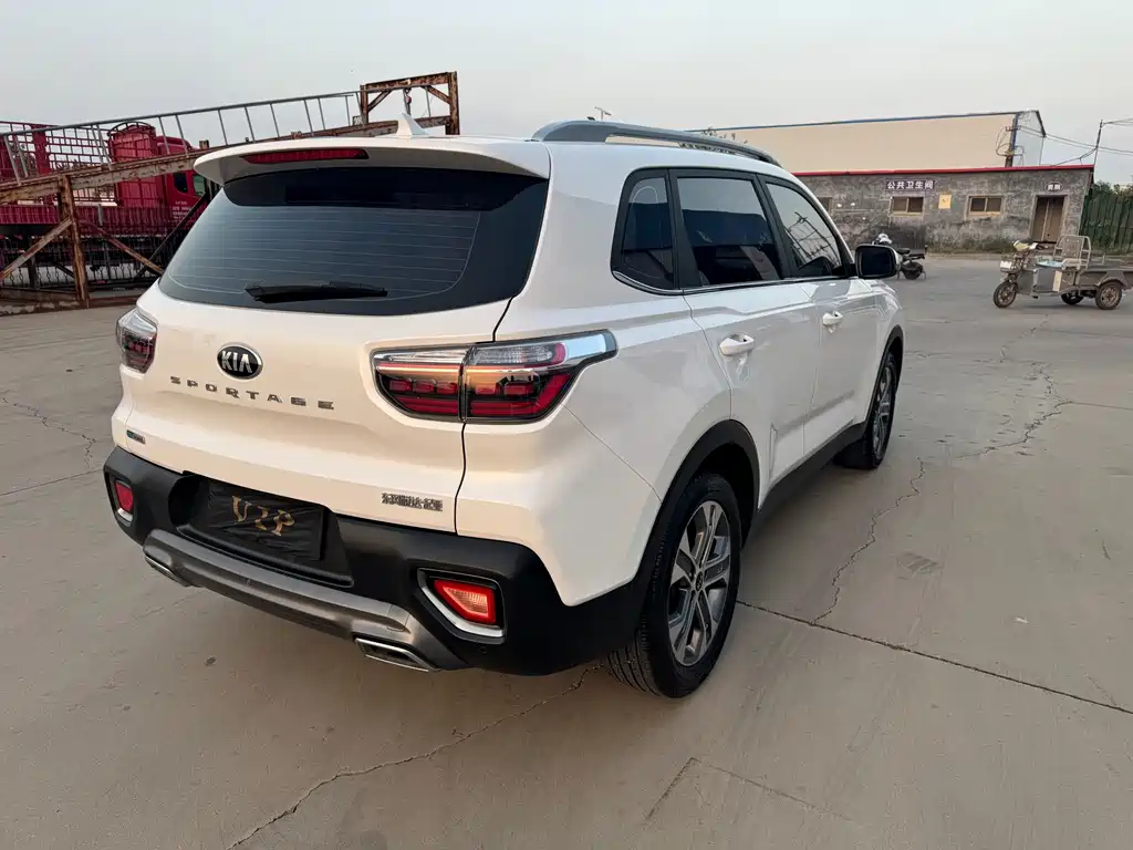 Kia Sportage — фото 8