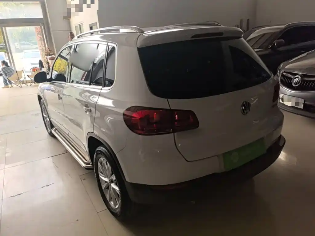Volkswagen Tiguan — фото 5