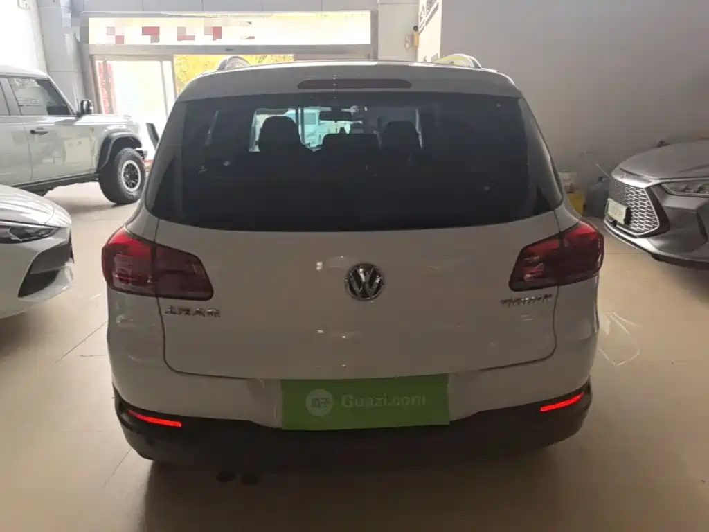 Volkswagen Tiguan — фото 6