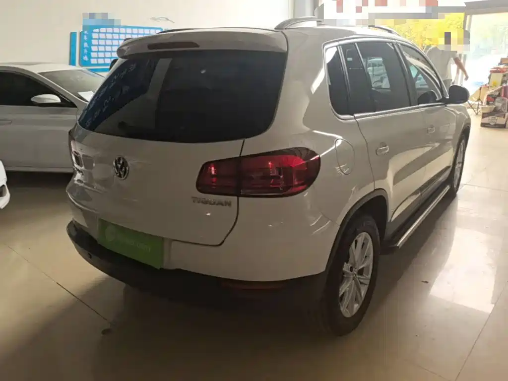 Volkswagen Tiguan — фото 7