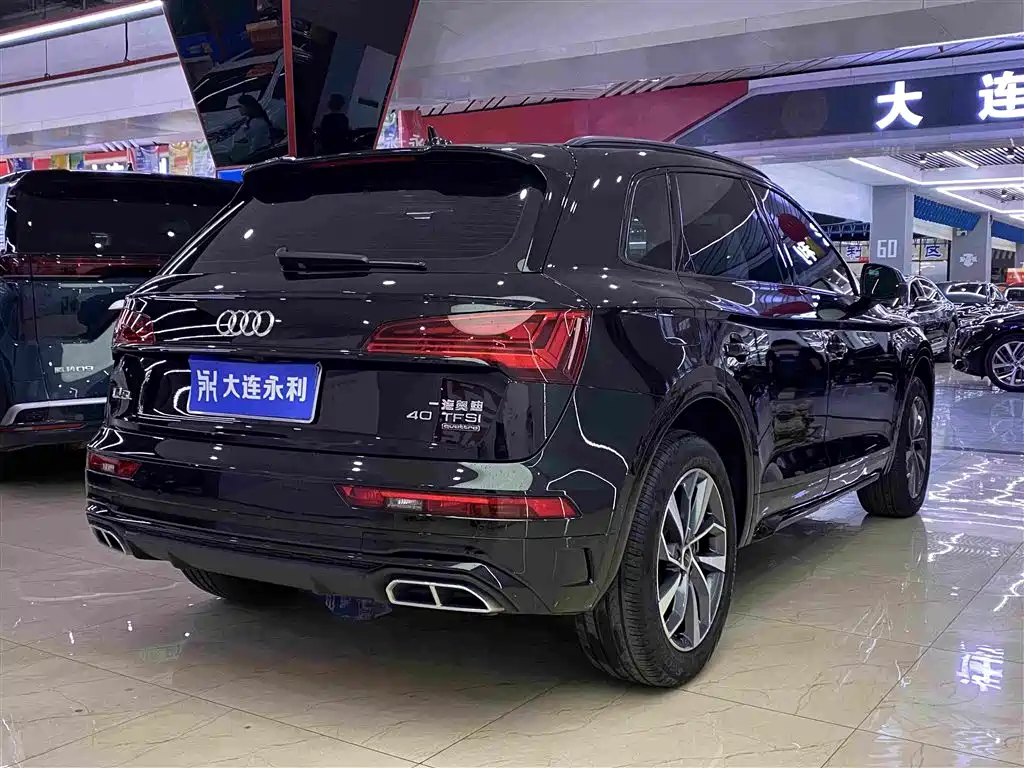 Audi Q5L — фото 16