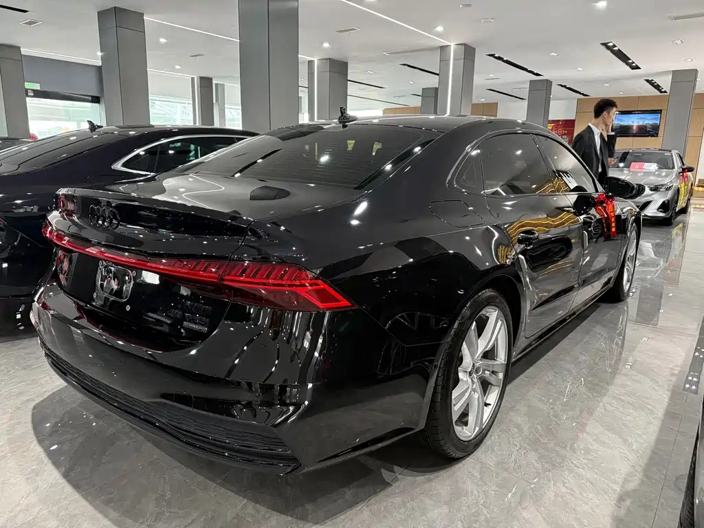 Audi A7L — фото 8
