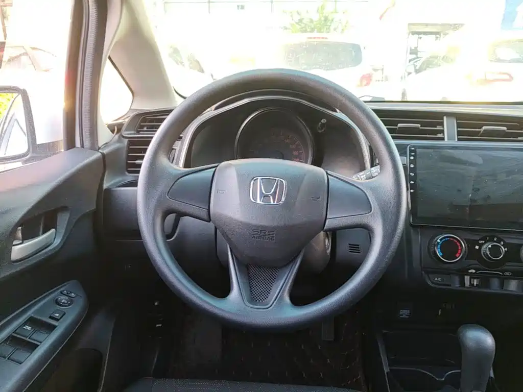Honda Fit — фото 11