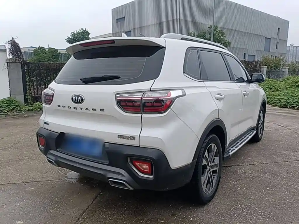 Kia Sportage — фото 7