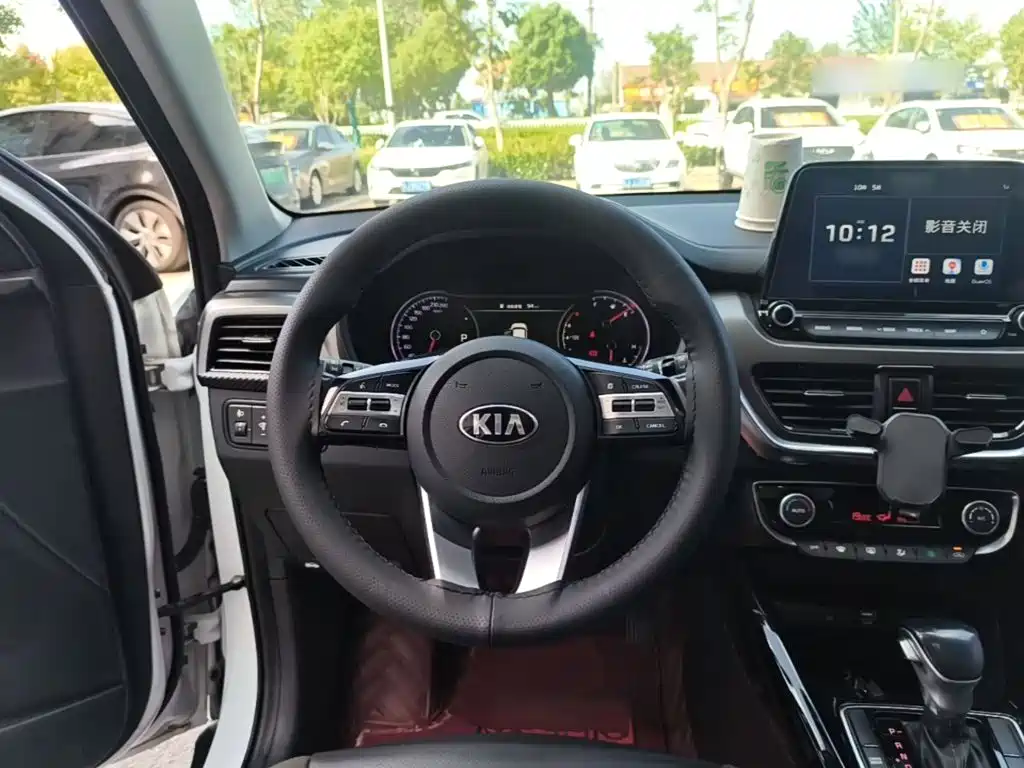 Kia Sportage — фото 11
