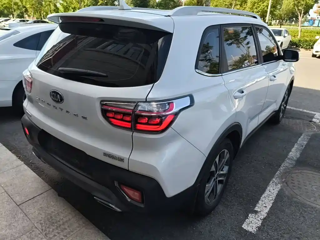 Kia Sportage — фото 7