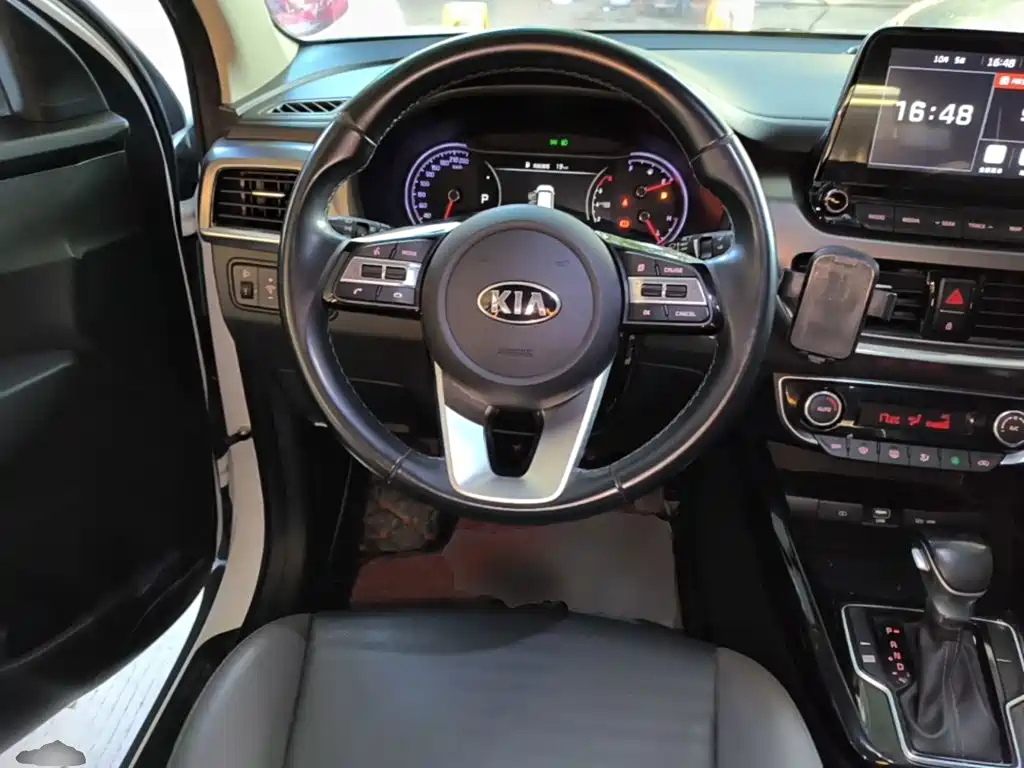 Kia Sportage — фото 11