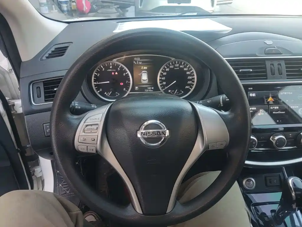 Nissan Tiida — фото 11