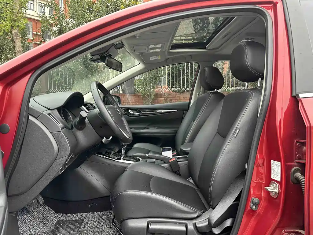 Nissan Tiida — фото 10