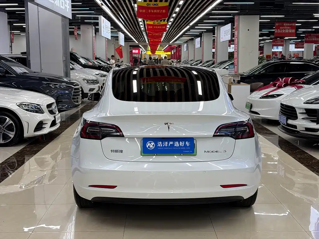 Tesla Model 3 — фото 14