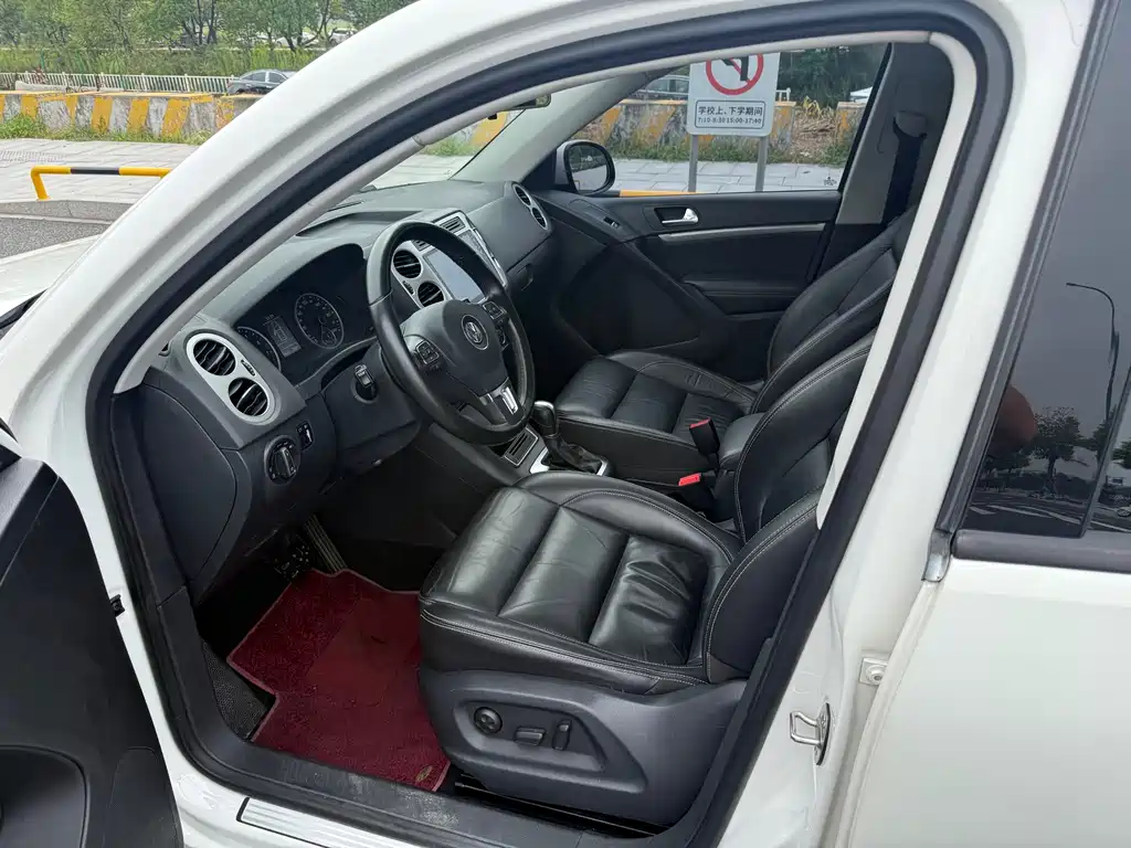 Volkswagen Tiguan — фото 7