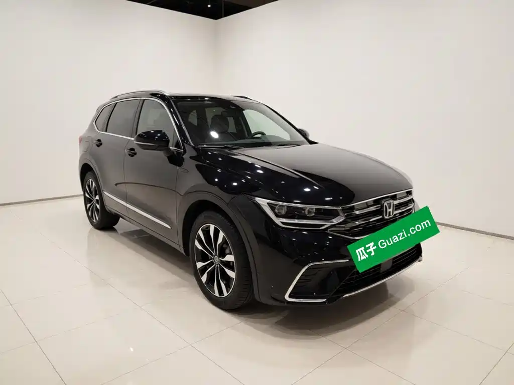 Volkswagen Tiguan L — фото 3