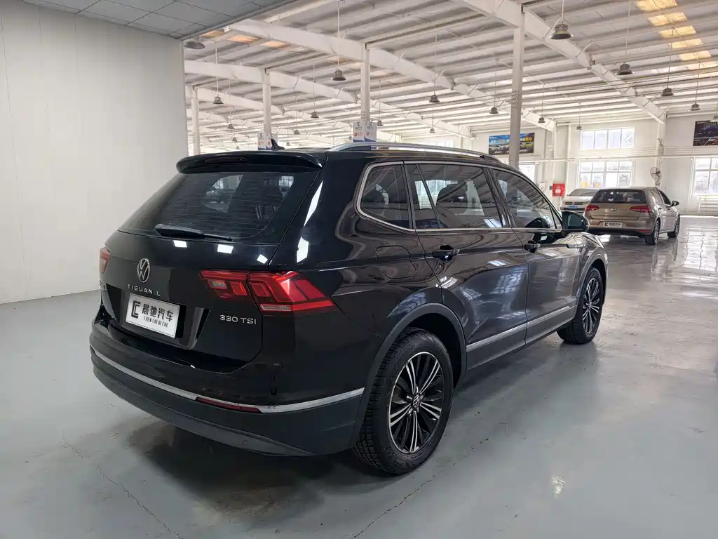 Volkswagen Tiguan L — фото 4