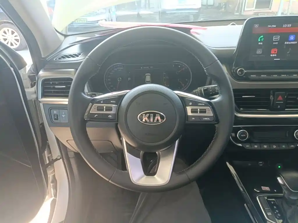 Kia Sportage — фото 11