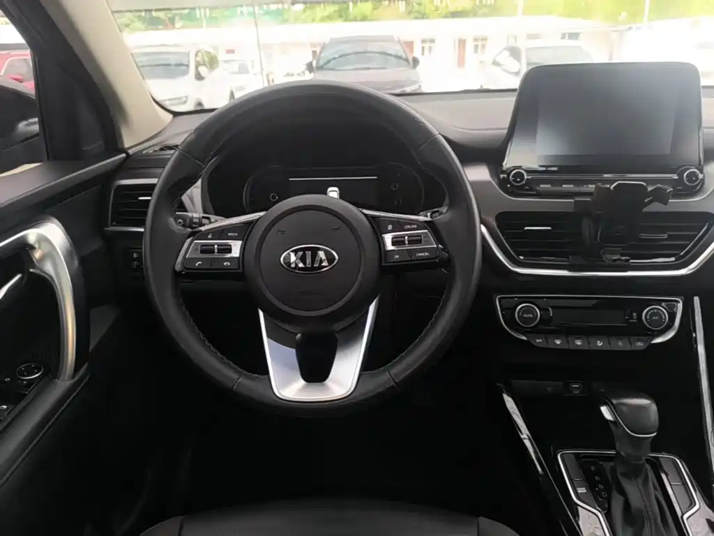 Kia Sportage — фото 11