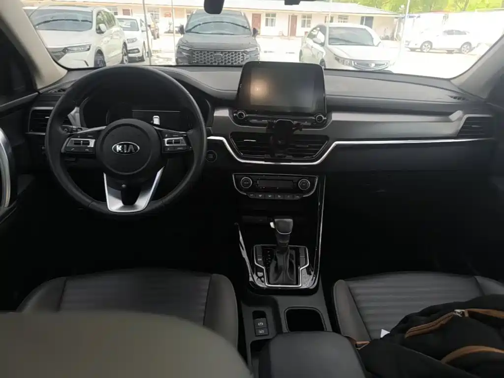 Kia Sportage — фото 10
