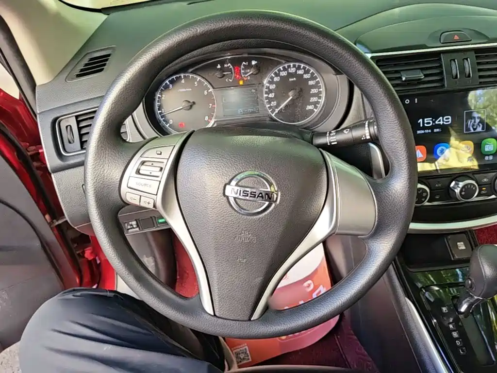 Nissan Tiida — фото 11