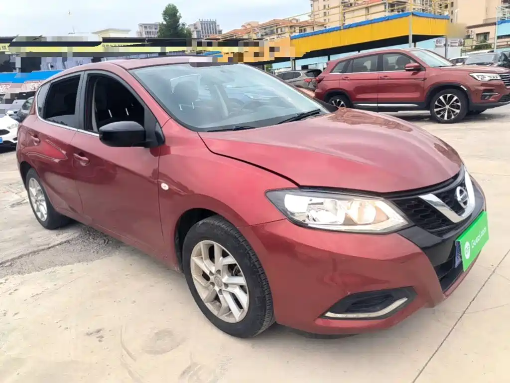 Nissan Tiida — фото 4