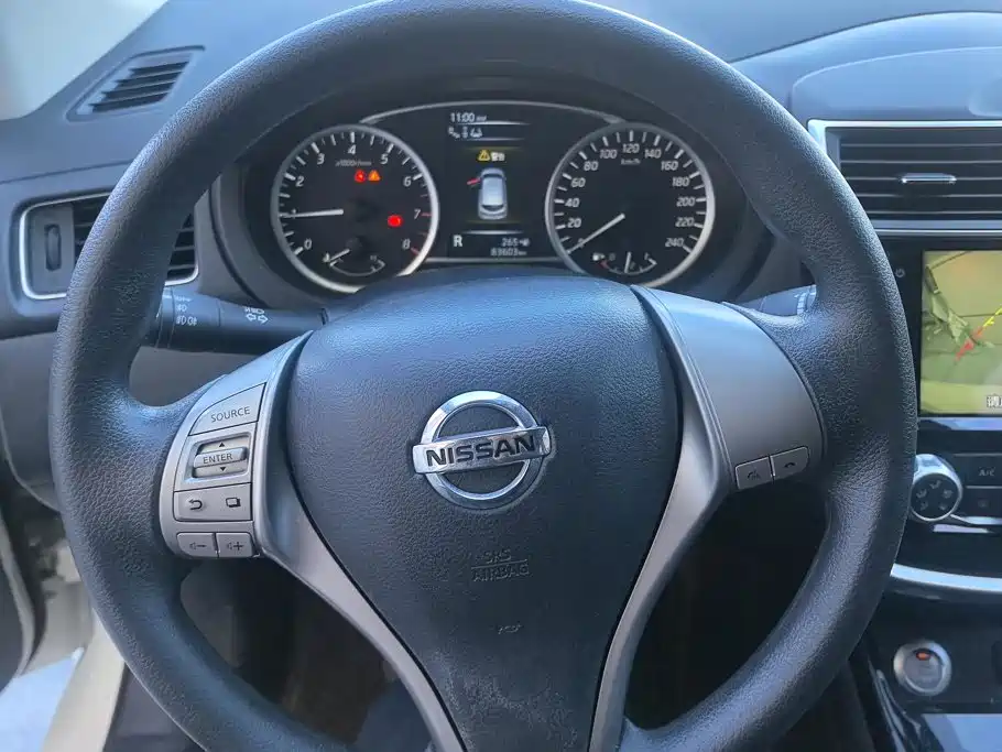 Nissan Tiida — фото 15