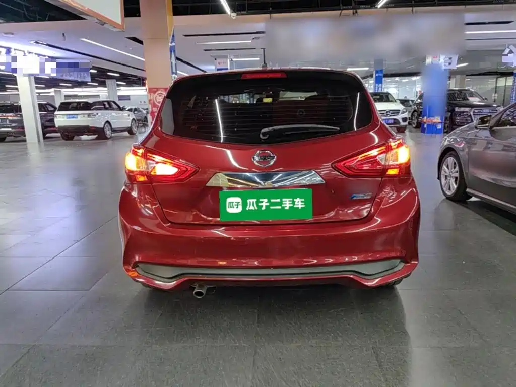 Nissan Tiida — фото 6