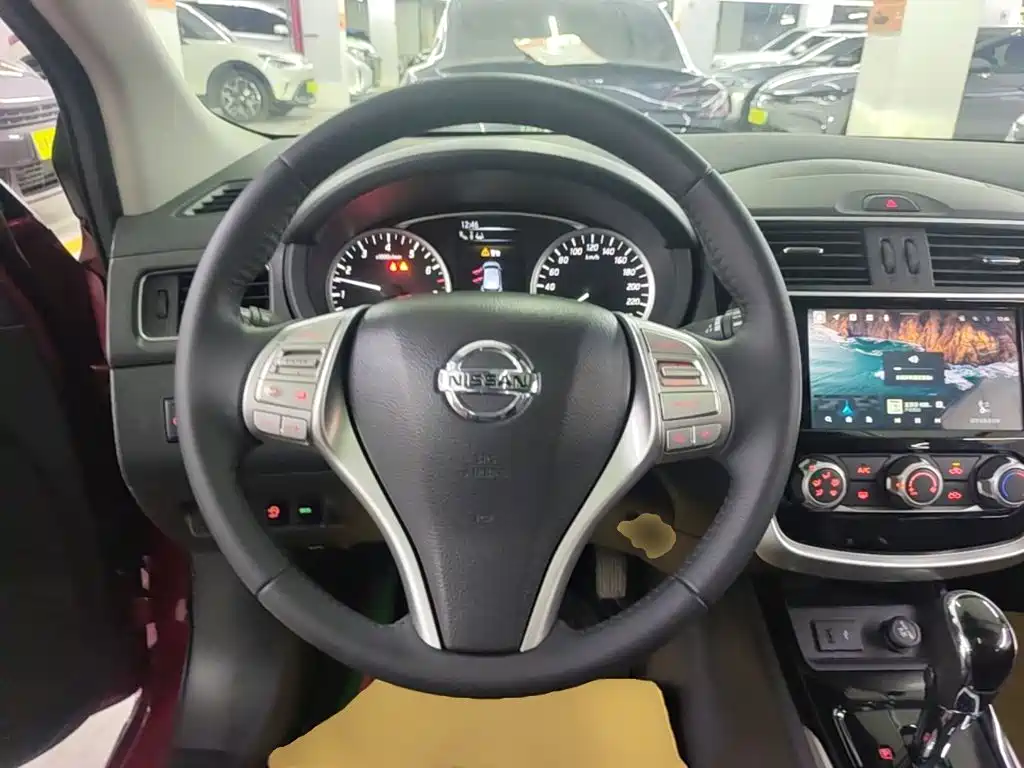 Nissan Tiida — фото 11