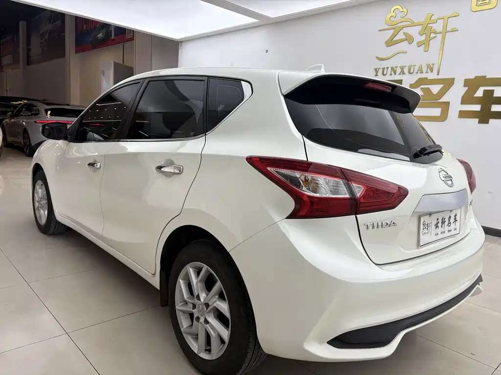 Nissan Tiida — фото 2
