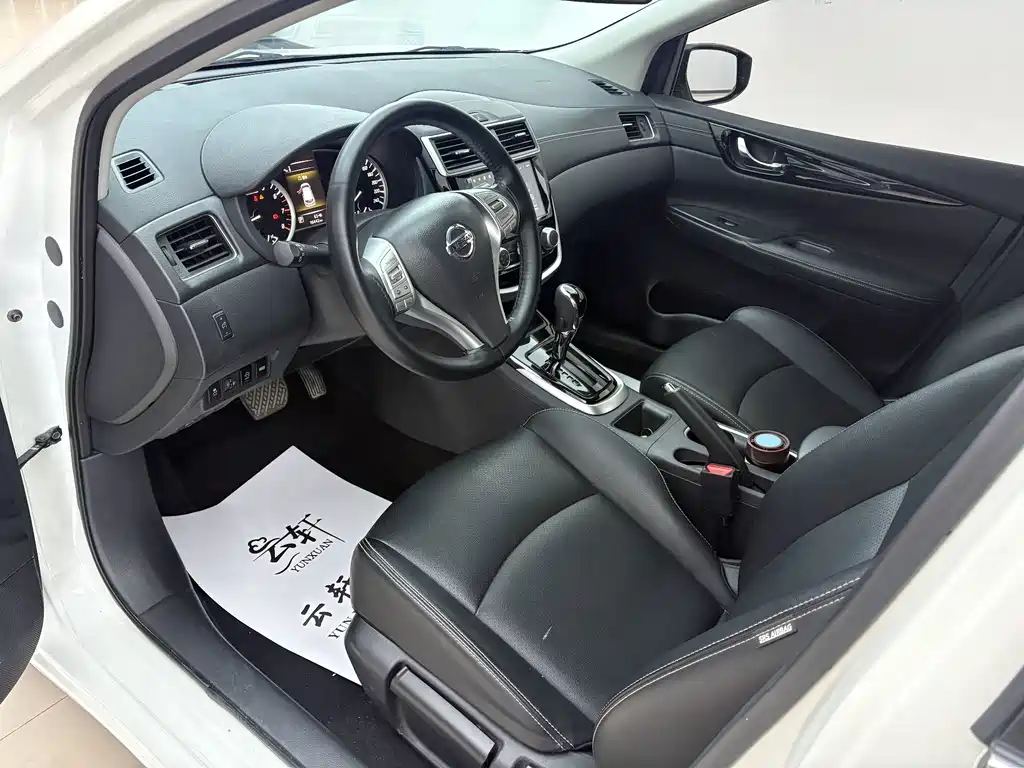 Nissan Tiida — фото 17