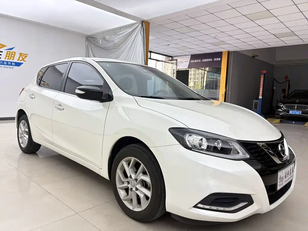 Nissan Tiida — фото 10