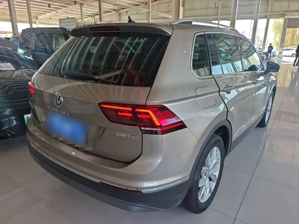 Volkswagen Tiguan — фото 7