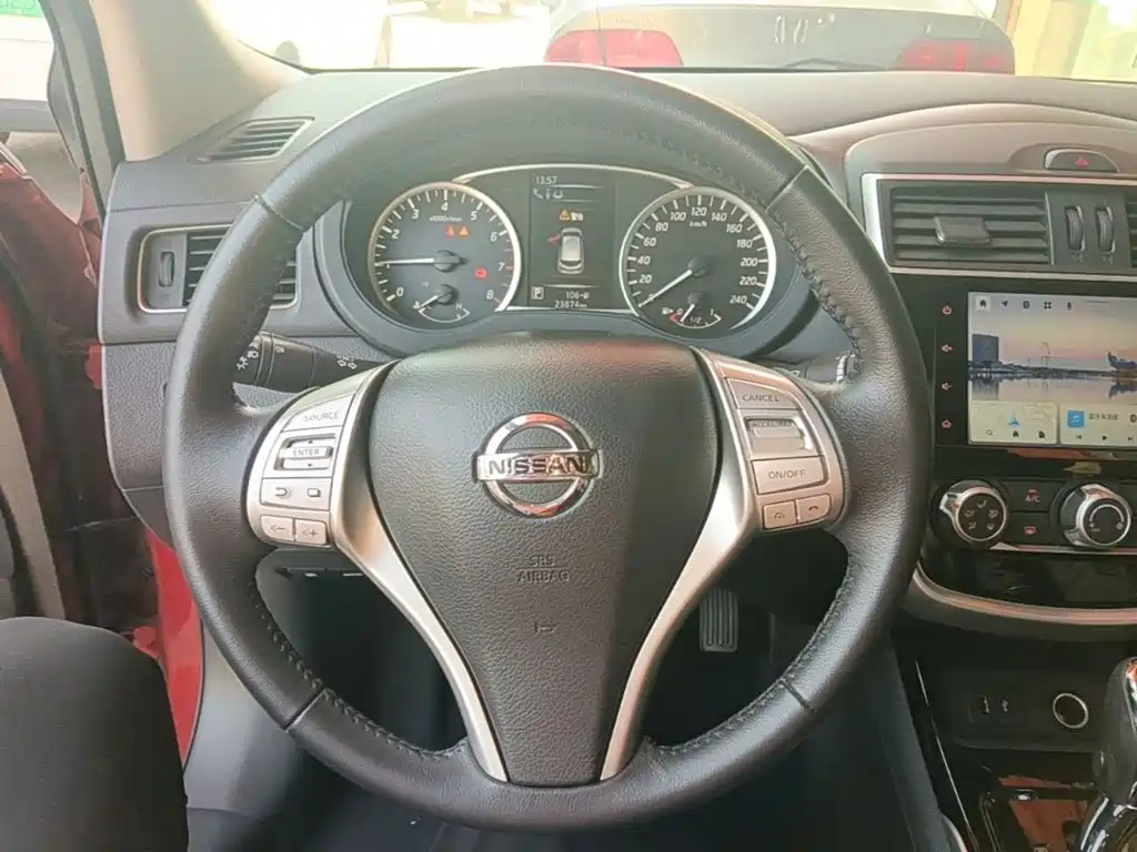 Nissan Tiida — фото 11