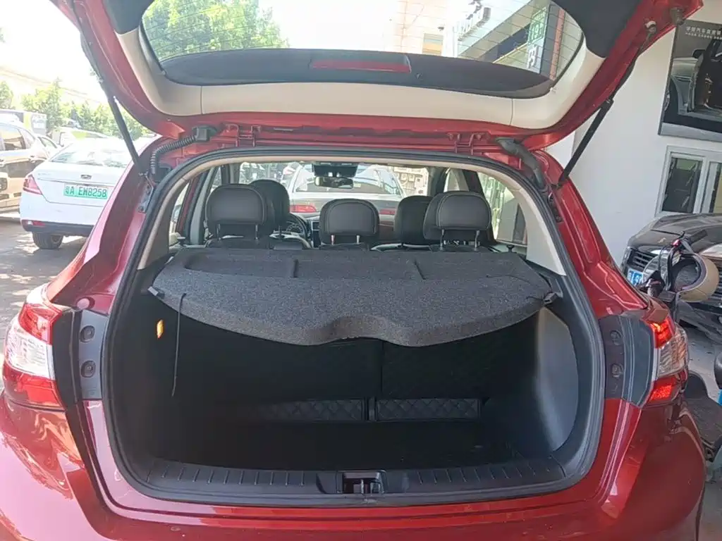 Nissan Tiida — фото 19