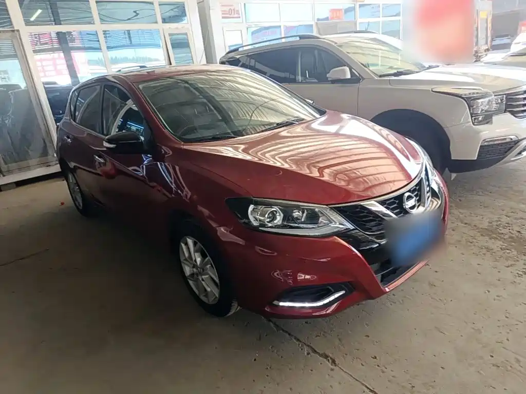 Nissan Tiida — фото 4