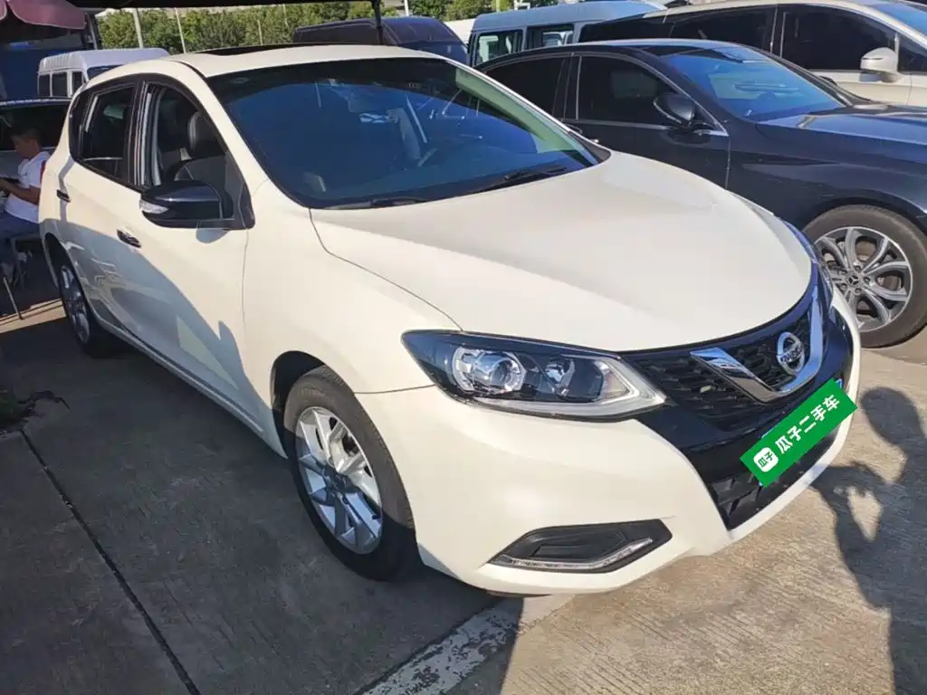 Nissan Tiida — фото 4