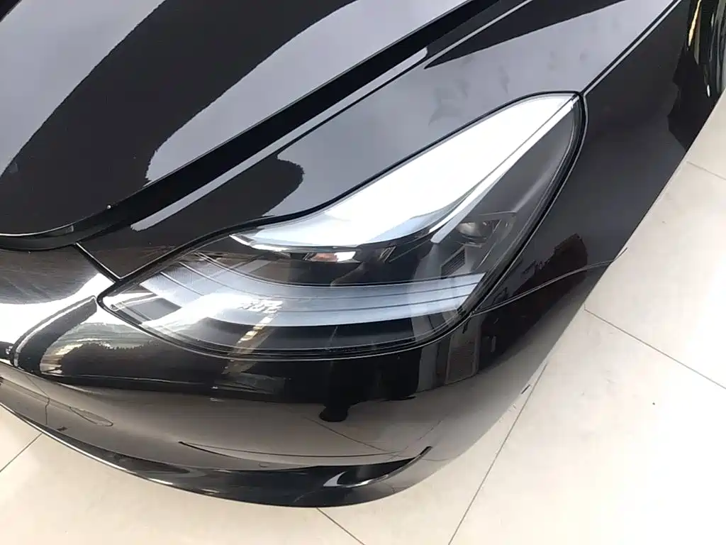 Tesla Model 3 — фото 18