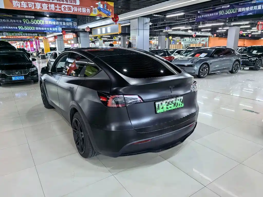 Tesla Model Y — фото 8