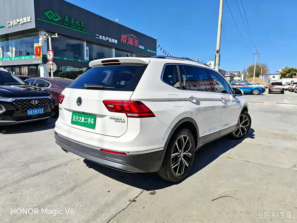 Volkswagen Tiguan L — фото 17