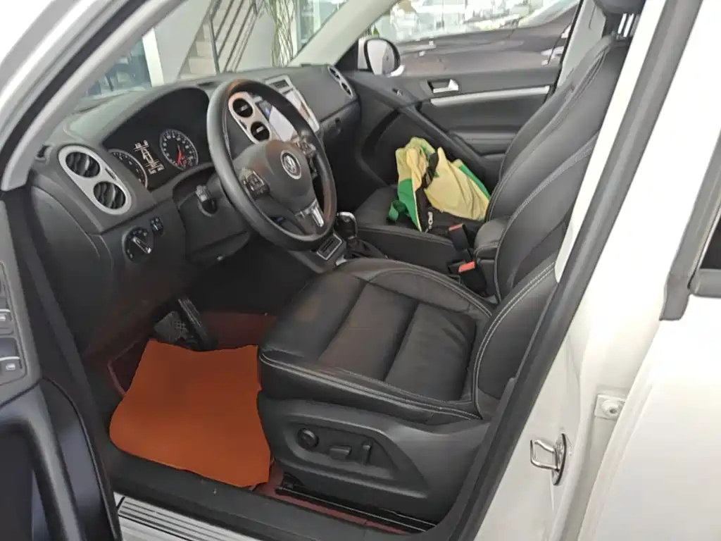 Volkswagen Tiguan — фото 15