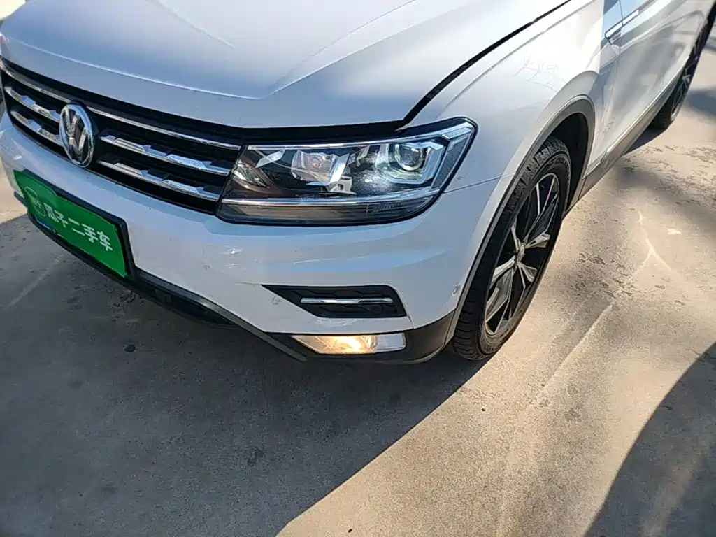 Volkswagen Tiguan L — фото 24