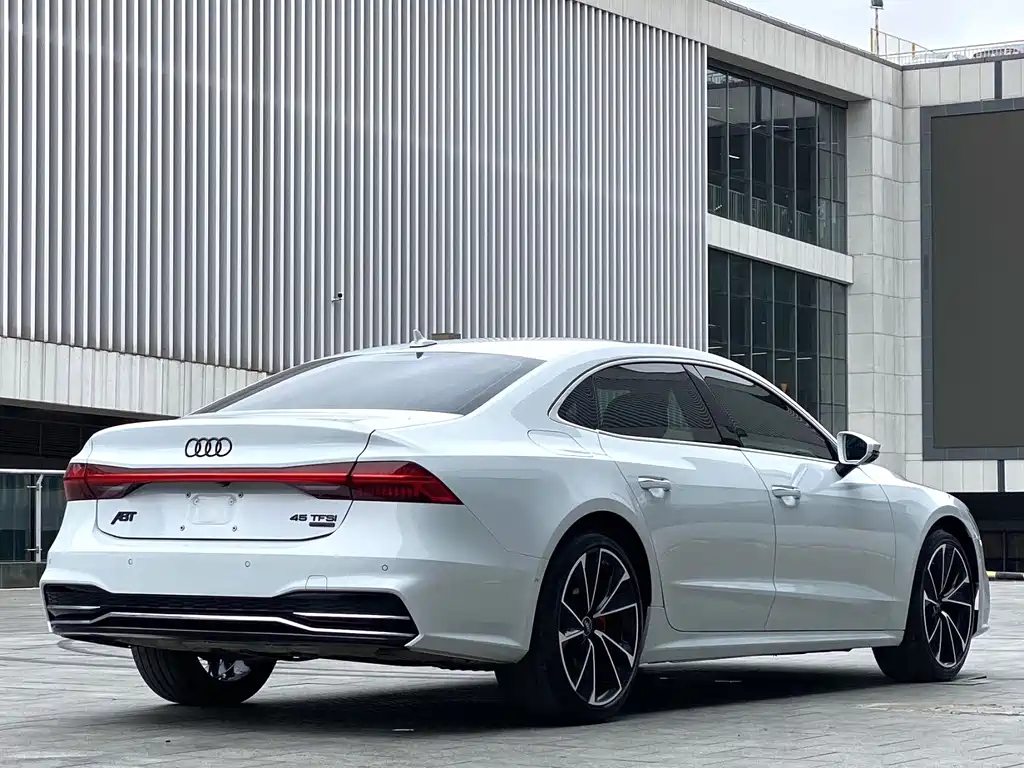 Audi A7L — фото 8