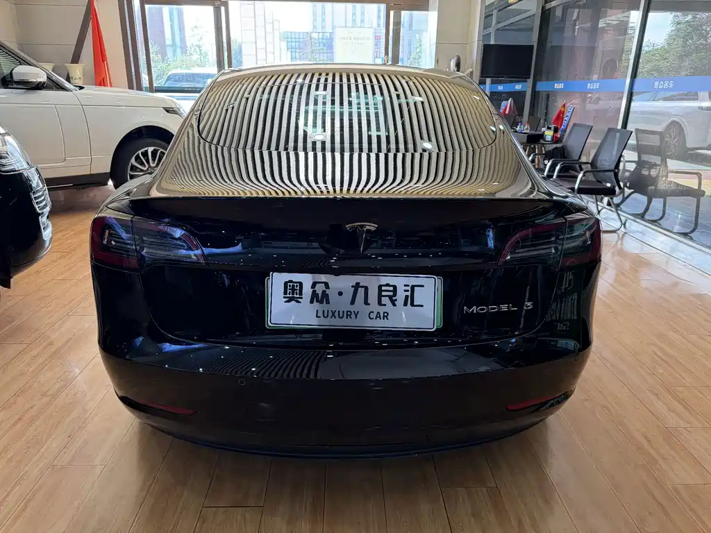Tesla Model 3 — фото 11