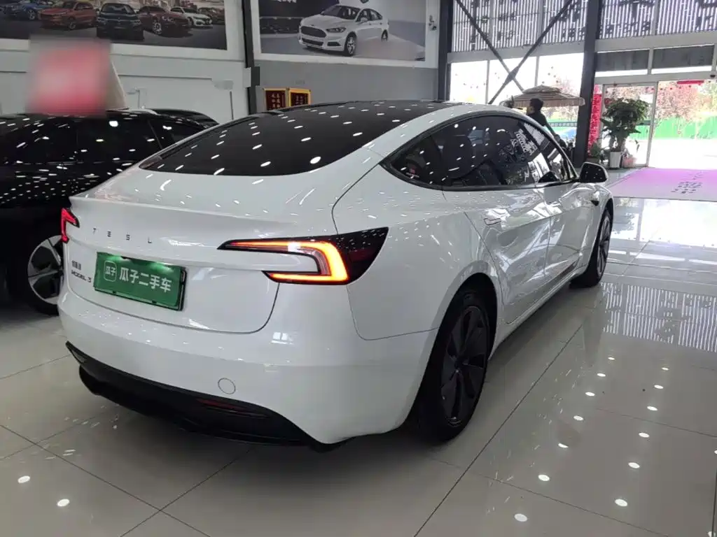 Tesla Model 3 — фото 7