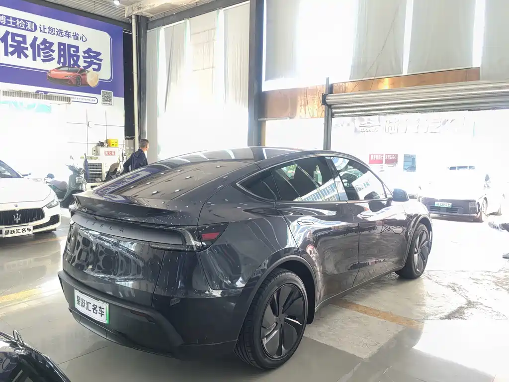 Tesla Model Y — фото 6