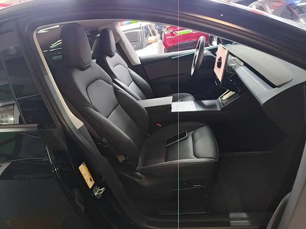 Tesla Model Y — фото 25