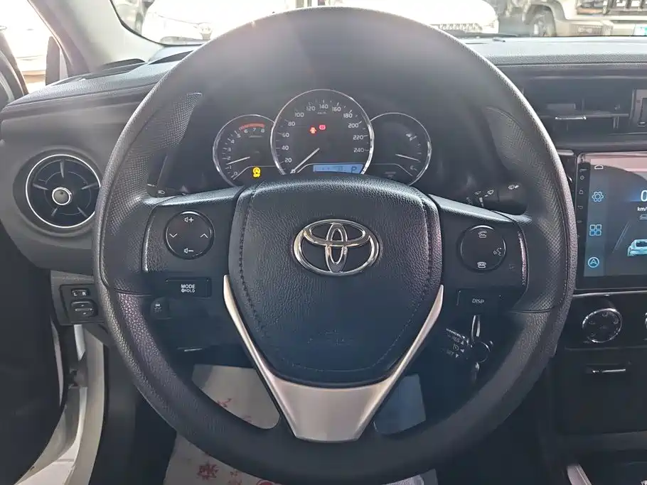 Toyota Corolla — фото 15