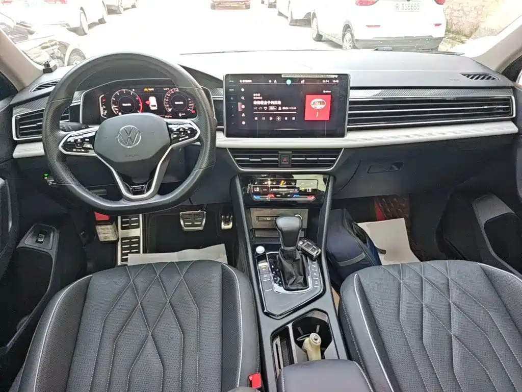 Volkswagen Tiguan L — фото 10