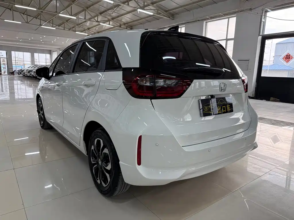 Honda Fit — фото 11